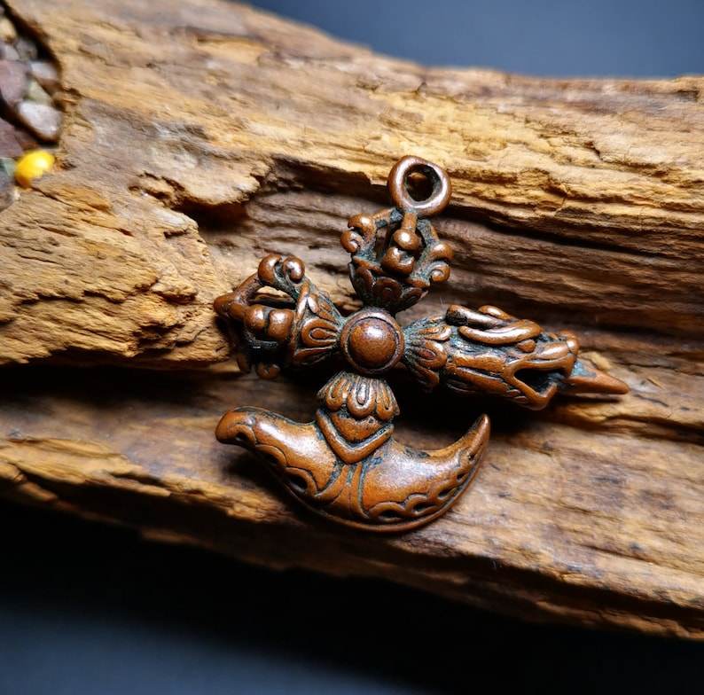 Amulet,Cross Kartika knife of the dakinis and Kila Dorje Phurba - Tibetan Buddhist amulet, front view