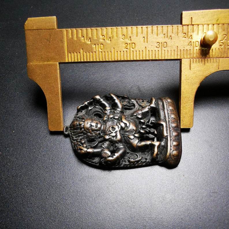 Thokcha Amulet Pendant,Mahakala, Buddhist Protector Deity, Made of Thunder Iron - Tibetan Buddhist amulet, size reference