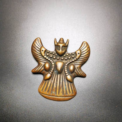 Buddhist Amulet,Garuda,Golden-winged Bird Pendant - Tibetan Buddhist amulet, close-up detail