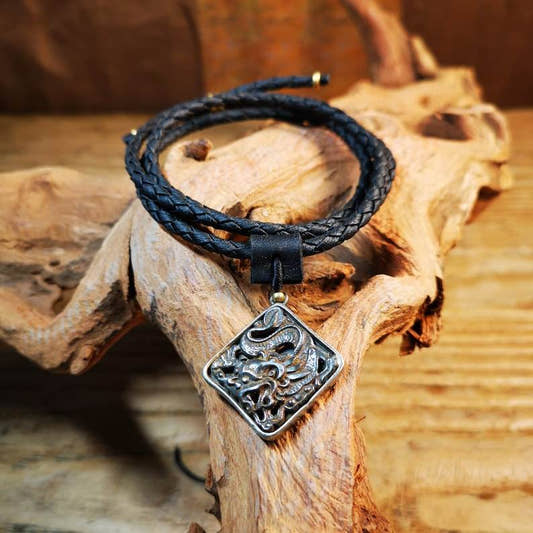 Amulet,Dragon -the Four Dignities - Tibetan Buddhist amulet, front view