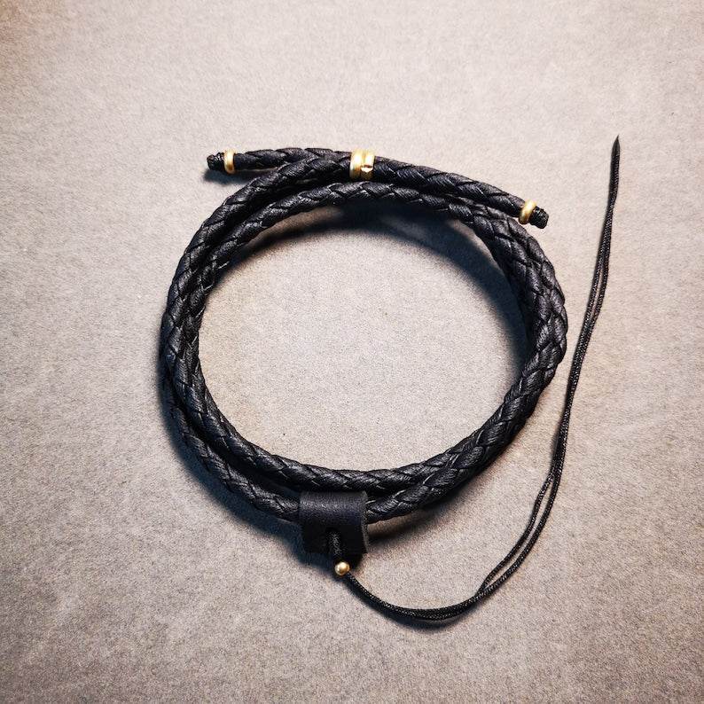 Handmade Leather Cord - Tibetan Buddhist art, close-up detail