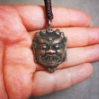 Amulet Badge,Mahakala Pendant, Buddhist Protector Deity, 50 Years Old - Tibetan Buddhist amulet, size reference