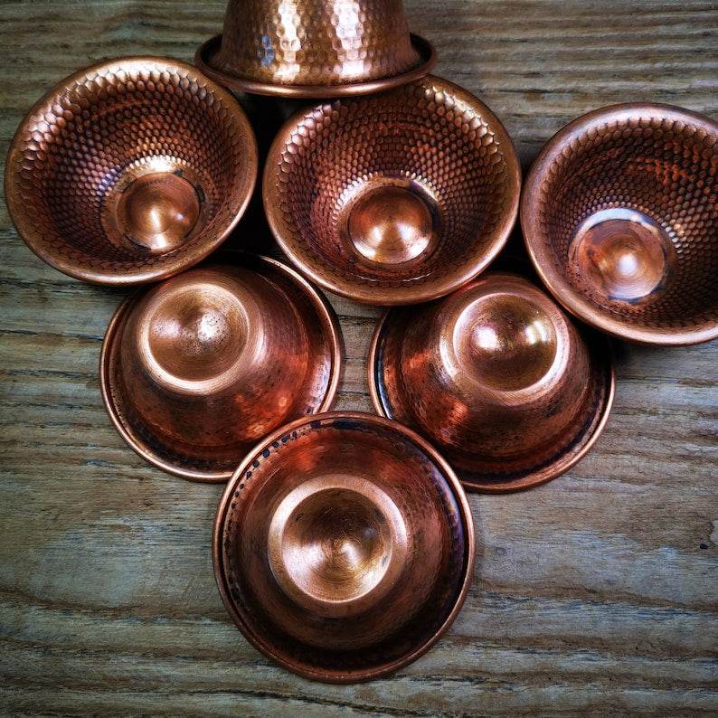 Buddhist Water Offering Bowls - Tibetan Buddhist art, close-up detail