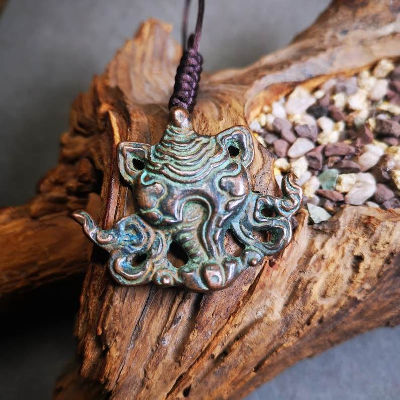 Acient Shankha Divine Conch Badge,Tibetan Buddhist Protective Amulet Pendant,Mad - Tibetan Buddhist amulet, close-up detail