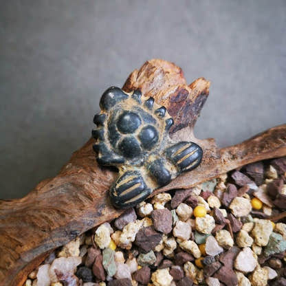 Buddhist Amulet Badge,Triratna,Mani Jewel/Wish-Fulfilling Cintamani,Nandipada Pe - Tibetan Buddhist amulet, close-up detail