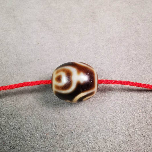 Round Treasure Vase Dzi Bead - Tibetan dzi bead, front view