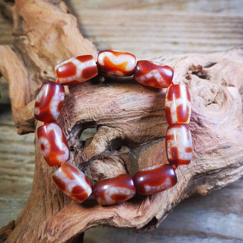 Fire Agate Dzi Bead Bracelet - Tibetan Buddhist mala beads, front view