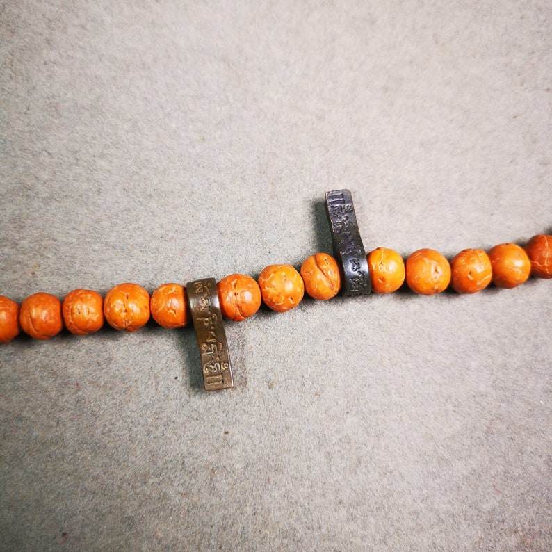 Thokcha Mala Counter Clip,Om Mani Padme Hum - Tibetan Buddhist mala beads, detailed view