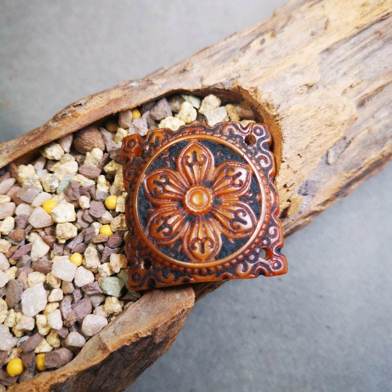 Yak Bone Carved Mandala Amulet Badge, Tibetan Buddhist Prayer Wheel Pendant,Dhar - Tibetan Buddhist amulet, close-up detail