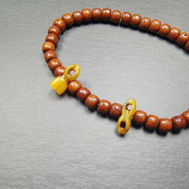 Amulet Vajra and Bell, Pendant for Mala,Prayer Beads - Tibetan Buddhist mala beads, detailed view