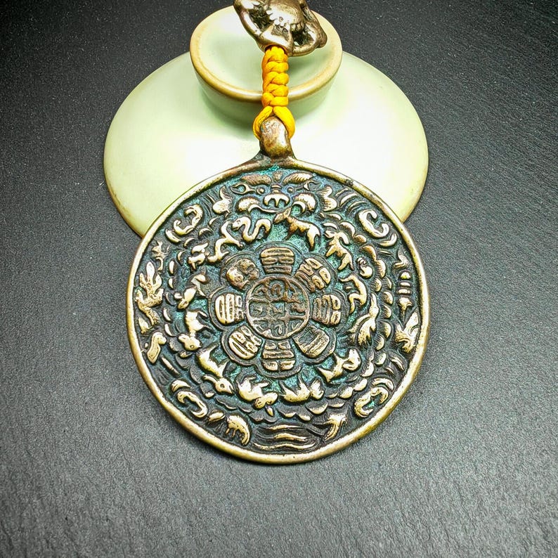 Amulet Sipaho Badge - Melong Mirror Calendar