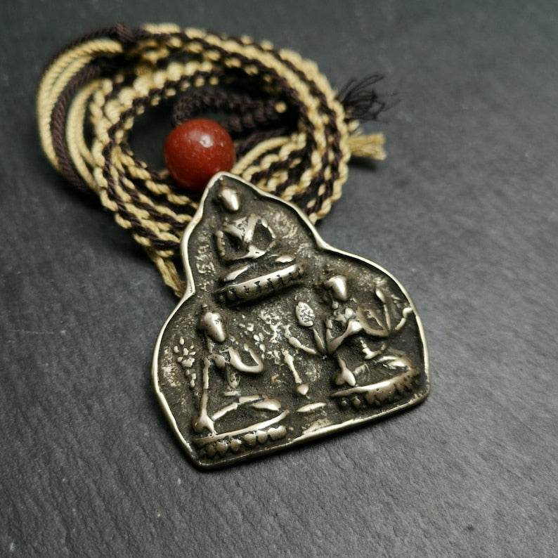 Statue Pendant,Protective Amulet - Tibetan Buddhist amulet, close-up detail