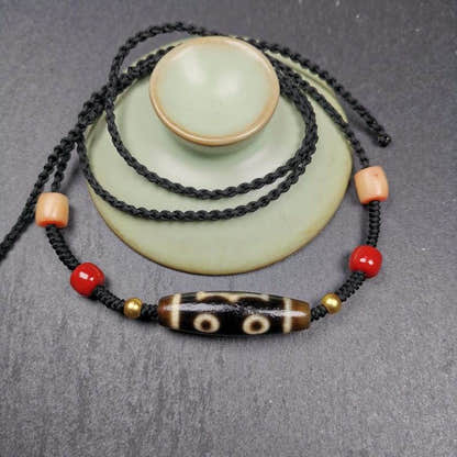 3 Eyes Dzi Bead Amulet,Protection Jewelry - Tibetan dzi bead, close-up detail