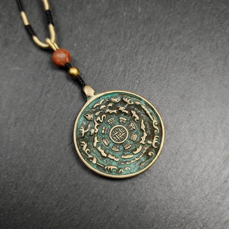 Calendar Amulet Sipaho Badge - Melong Mirror 43mm - Tibetan Buddhist amulet, front view