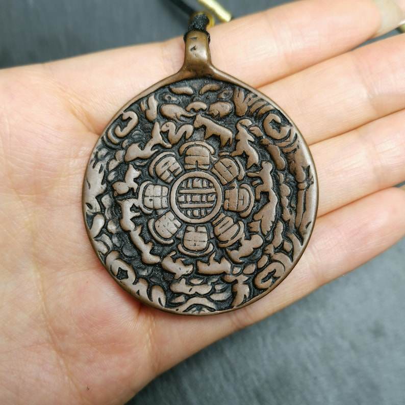 Calendar Amulet Sipaho Badge - Melong Mirror,45mm - Tibetan Buddhist amulet, close-up detail