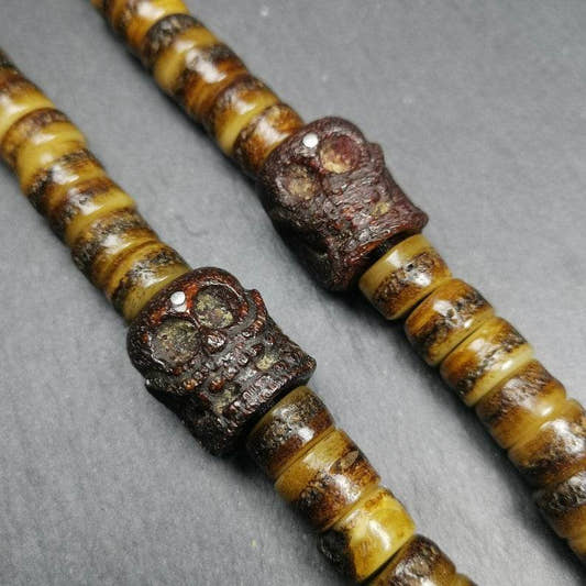Kapala Bone Skull Bead - Tibetan Buddhist art, front view