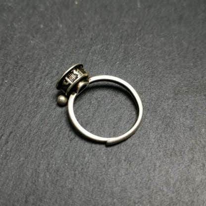 Silver Prayer Wheel Ring - Tibetan Buddhist art, close-up detail
