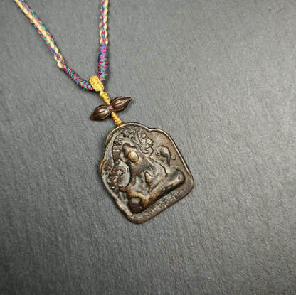 Buddha Statue Amulet Guru Rinpoche,Padmasambhava Pendant,Lotus Born - Tibetan Buddhist amulet, close-up detail