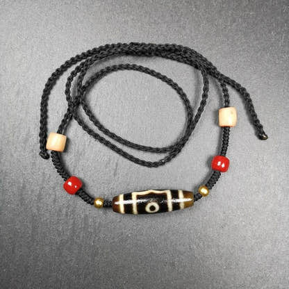 3 Eyes Dzi Bead Amulet,Protection Jewelry - Tibetan dzi bead, front view