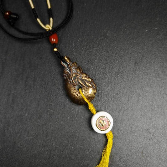 Amulet, Dragon Charm Pendant - Tibetan Buddhist amulet, front view