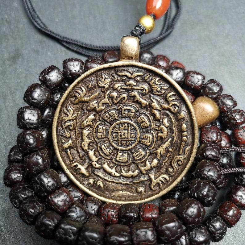 Calendar Amulet Sipaho Badge - Melong Mirror,45mm - Tibetan Buddhist amulet, close-up detail