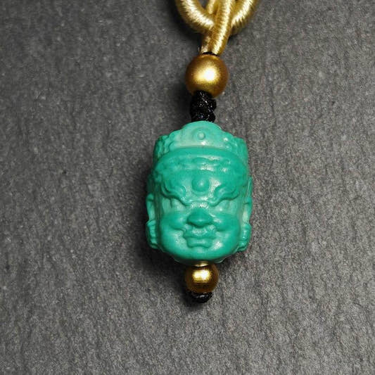 Turquoise Mahakala Amulet - Tibetan Buddhist amulet, front view