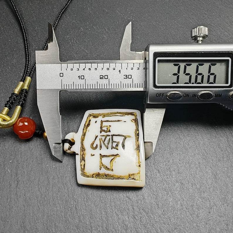 Amulet Badge with Tibetan Letters - Tibetan Buddhist amulet, size reference
