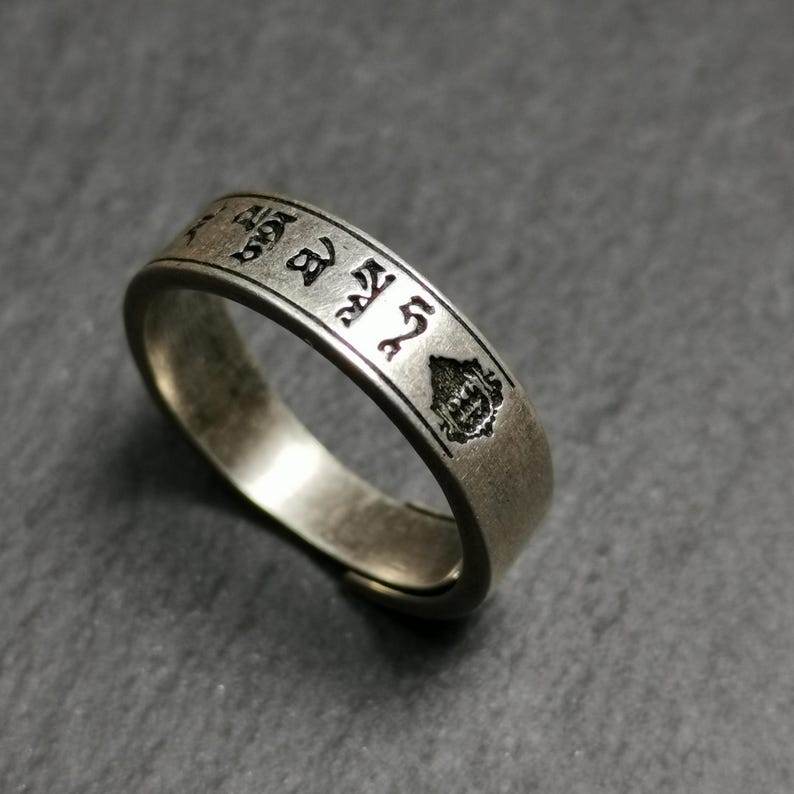 Silver Ring - Tibetan Buddhist art, front view