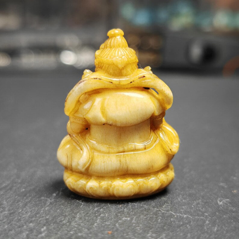 Gandhanra Antique Consecrated Tibetan Buddha statue - Yellow Jambhala(Dzambhala),Carved from Deer Antlers,40mm × 30mm × 20mm