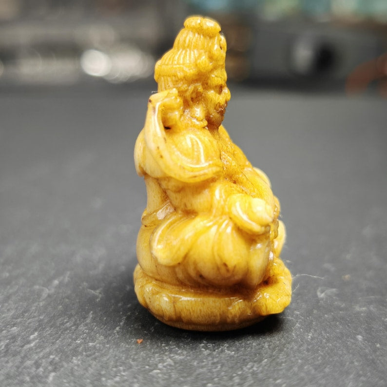 Gandhanra Antique Consecrated Tibetan Buddha statue - Yellow Jambhala(Dzambhala),Carved from Deer Antlers,40mm × 30mm × 20mm