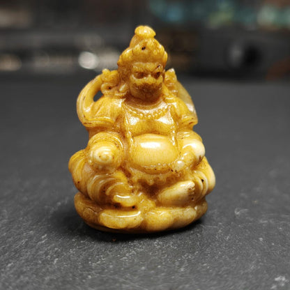 Gandhanra Antique Consecrated Tibetan Buddha statue - Yellow Jambhala(Dzambhala),Carved from Deer Antlers,40mm × 30mm × 20mm