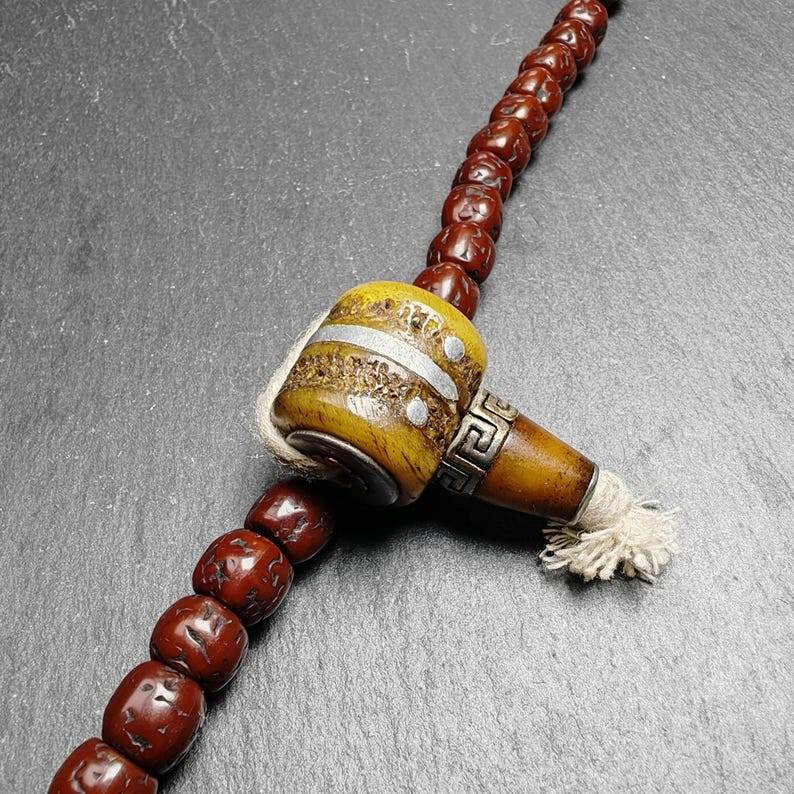 T-drilled 3-Hole Connector Bead - Tibetan Buddhist art, detailed view