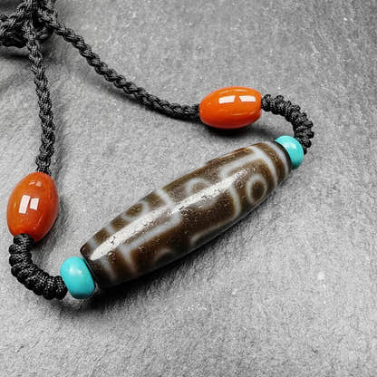Tibetan 9 Eyes Dzi Bead Necklace - Tibetan Buddhist bead necklace, close-up detail