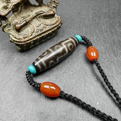 Tibetan 9 Eyes Dzi Bead Necklace | 1.5" x 0.4"