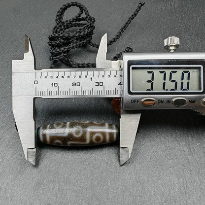 Tibetan 9 Eyes Dzi Bead Necklace | 1.5" x 0.4"
