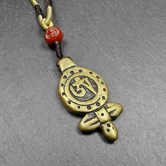 Tibetan Buddhism Amulet - Vajra Pendant with OM Symbol - Tibetan Buddhist amulet, front view