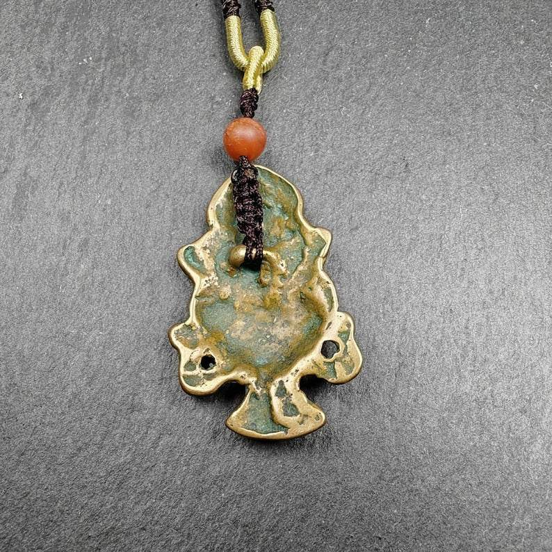 Lima Brass Amulet,Treasure Vase Badge - Tibetan Buddhist amulet, detailed view