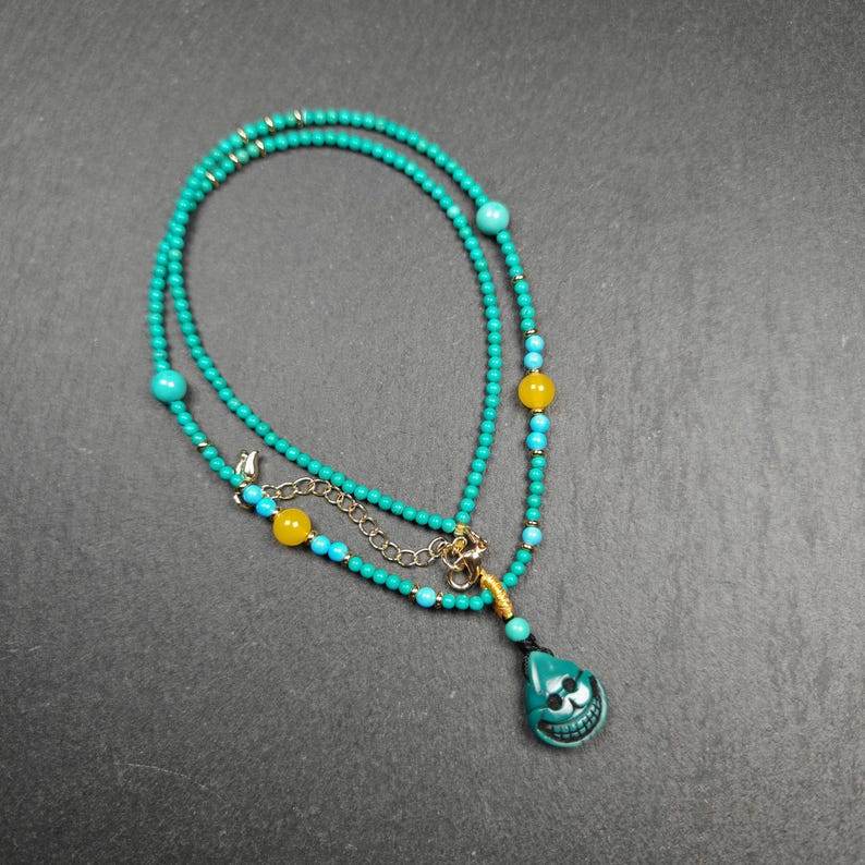 Turquoise Citipati Skull Protective Necklace,23cm Length - Tibetan Buddhist bead necklace, front view