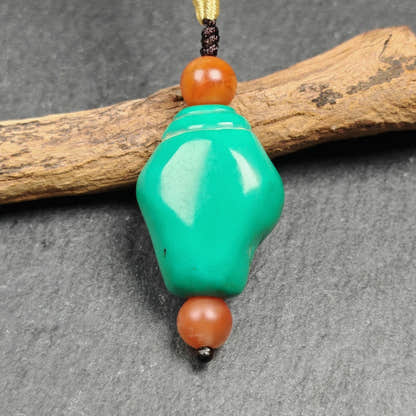 Shankha Amulet,Hand Carved Turquoise Conch Shell Pendant,25 - Tibetan Buddhist amulet, close-up detail