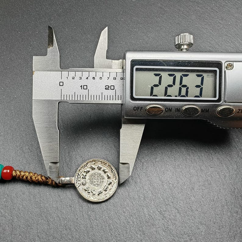 Calendar Badge,Melong Mirror, SIPAHO Amulet - Tibetan Buddhist amulet, size reference