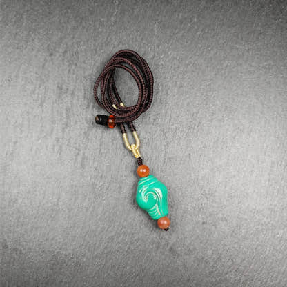 Shankha Amulet,Hand Carved Turquoise Conch Shell Pendant,25 - Tibetan Buddhist amulet, front view