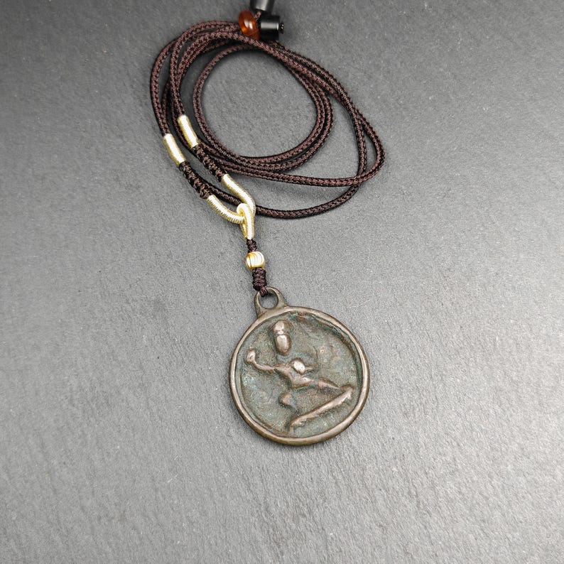 Handmade Thokcha Vajrapani Amulet Badge - Tibetan Buddhist amulet, front view