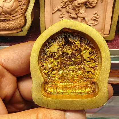 Red Jambhala - Dzambhala Marpo Tsa Tsa Mold - Tibetan tsa tsa mold, detailed view