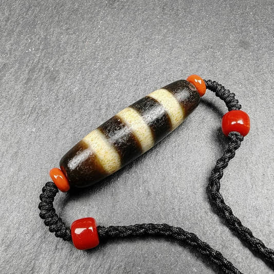 Stripe Dzi Bead Amulet - Tibetan dzi bead, front view