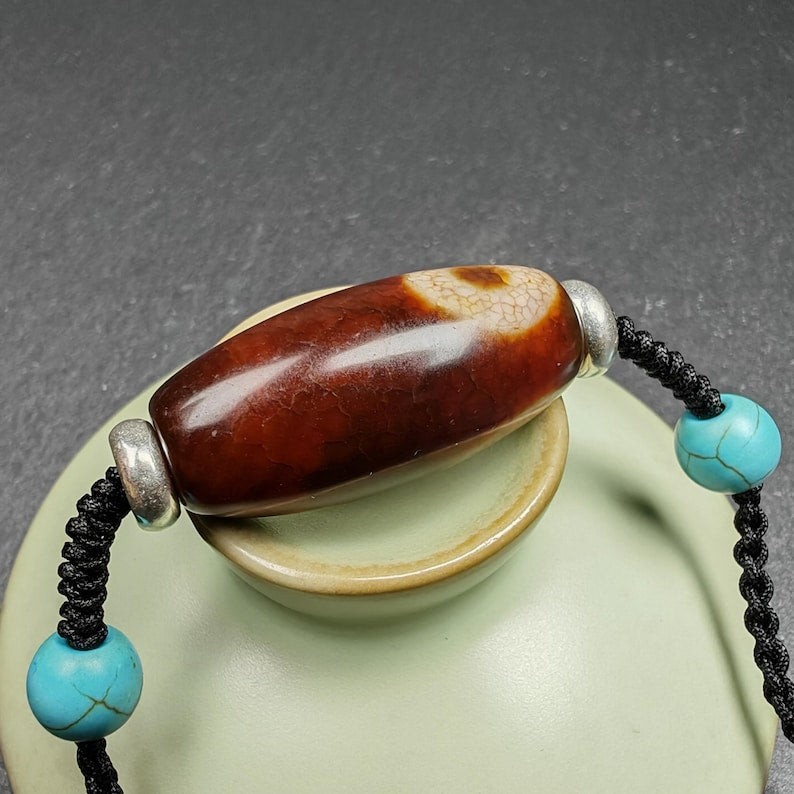 Fire Agate Lotus Dzi Amulet 31 x 15mm