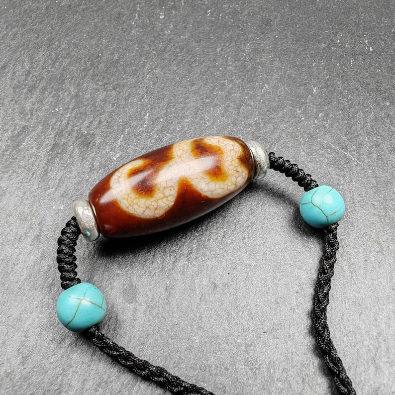Fire Agate Lotus Dzi Amulet 31 - Tibetan dzi bead, front view