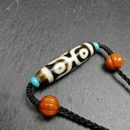 Cross Vajra 6 Eyed Dzi Bead Necklace - Tibetan Buddhist bead necklace, close-up detail
