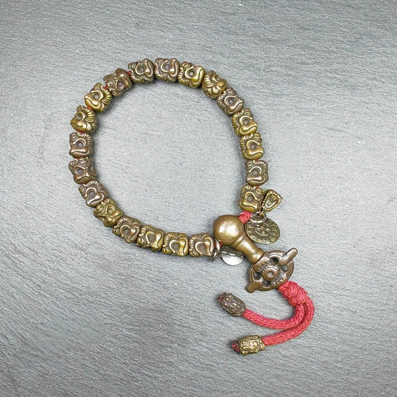 Thokcha Wrist Mala - 9mm Tibetan Garuda Bird Beads