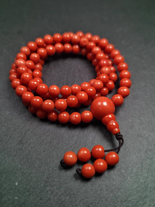 8mm Red Bamboo Coral Necklace Mala - 41cm stretched - Tibetan Buddhist mala beads, front view