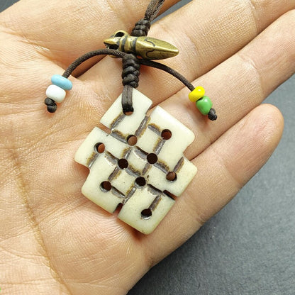 Handcarved Yak Bone Lucky Knot Amulet / Endless Knot Pendant